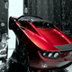 A Tesla roadster is tucked inside the carbon fiber fairing, or nose cone, on the Falcon Heavy rocket.